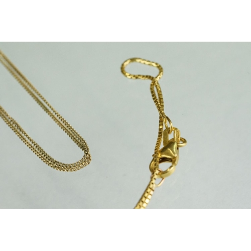 221A - A small collection of gold jewellery to include a 14k gold ring and 9ct gold necklaces.