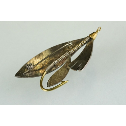 223 - A fully hallmarked sterling silver and enamel brooch in the form of a fishing fly.