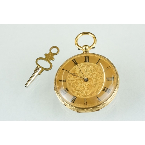 229 - A late 19th / early 20th century 18ct gold cased Swiss made pocket watch together with key.