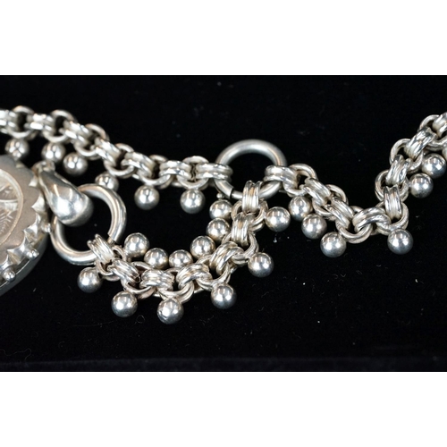 230 - A fully hallmarked sterling silver locket pendant on ornate silver chain.