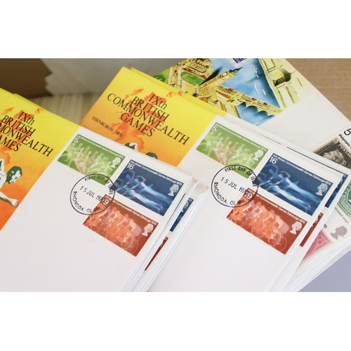 467 - A large collection of mainly British first day covers together with a small collection of stamps wit... 