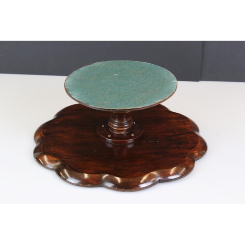 191 - 1930s mahogany lazy Susan of lobed form with beaded edge on turned support, diameter approx 37.5cm