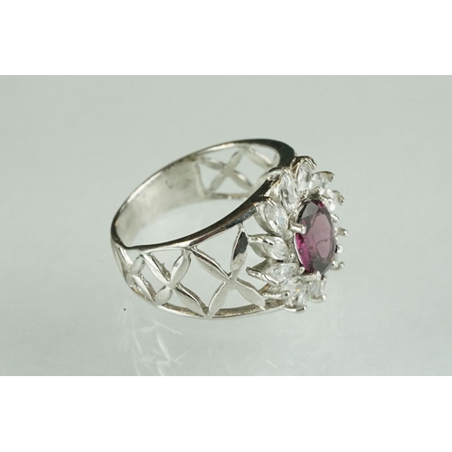 246 - Silver and CZ dress ring with central amethyst panel