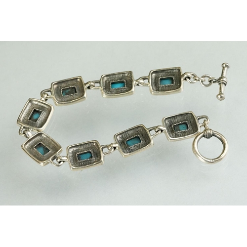 249 - Silver and turquoise panelled line bracelet