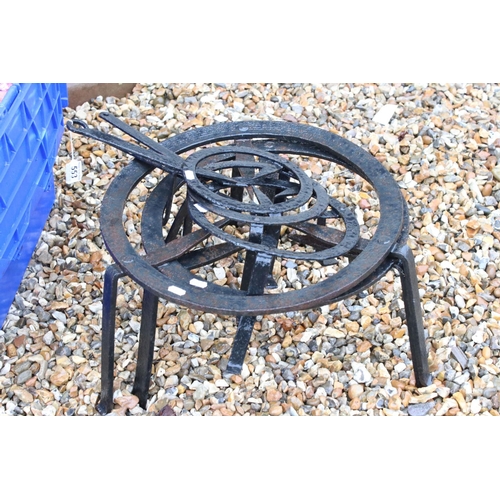 553 - Five Wrought Iron Trivets, largest 47cm diameter