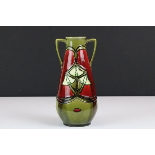 12 - Minton Secessionist Red and Green Glazed Twin Handled Vase, marked No. 12 to base, 21cm high