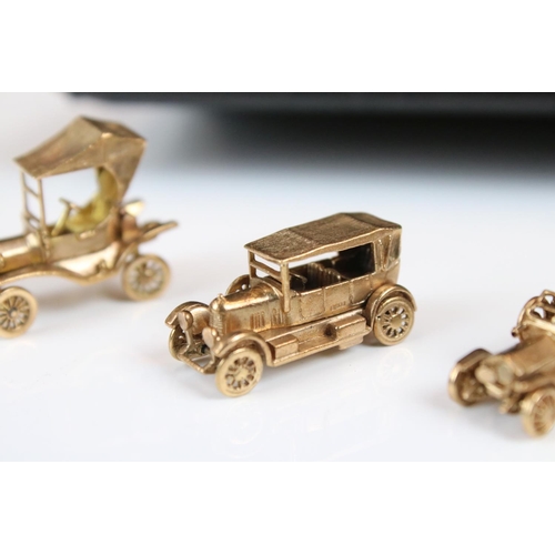 135 - A cased set of six fully hallmarked 9ct gold model cars by E&H of Birmingham to include Ford, Morris... 