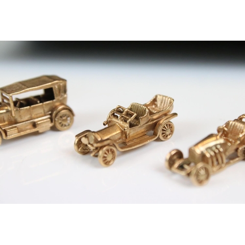 135 - A cased set of six fully hallmarked 9ct gold model cars by E&H of Birmingham to include Ford, Morris... 