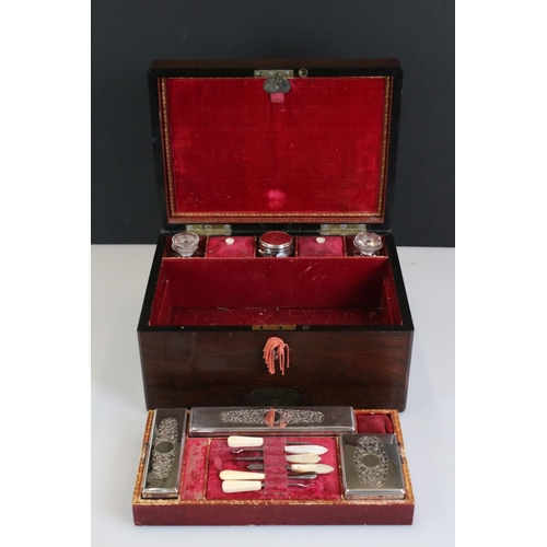 187 - 19th Century mahogany vanity box, the interior having fitted compartments containing glass bottles a... 