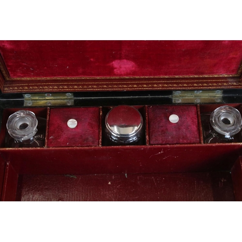 187 - 19th Century mahogany vanity box, the interior having fitted compartments containing glass bottles a... 