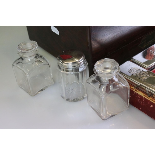 187 - 19th Century mahogany vanity box, the interior having fitted compartments containing glass bottles a... 