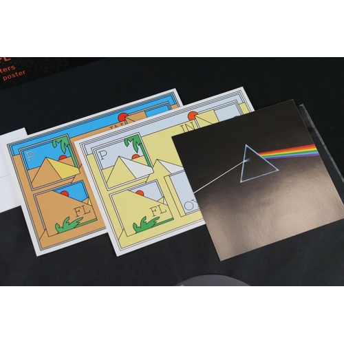 11 - Vinyl - Pink Floyd Dark Side Of The Moon (SHVL 804) 180gm reissue.  EU pressing.  Sticker and poster... 