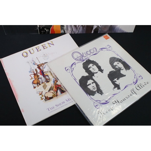 34 - Vinyl - 4 Queen LP's and 1 Brian May LP to include The Show Must Go On (12 QUEENSG 19) sleeve has st... 