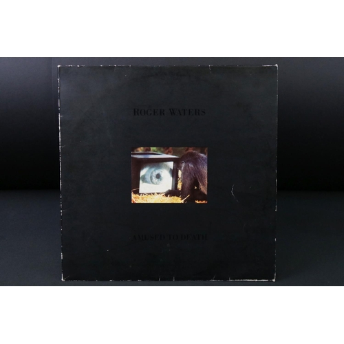 51 - Vinyl - Roger Waters Amused To Death on Columbia 468761 0.  Sleeve has corner and seam wear from sto... 