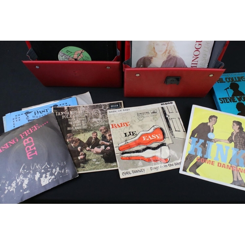 659 - Vinyl - A collection of over 80 7” singles in two record boxes spanning the decades and genres, but ... 