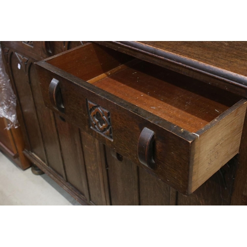 641 - Early 20th century Arts and Crafts Oak Dresser, comprising an upper section with shelves flanked by ... 