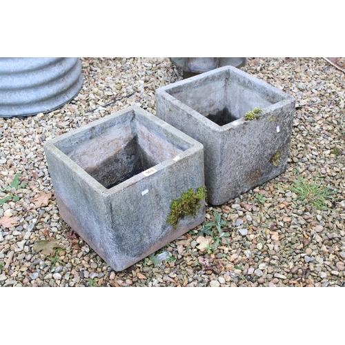 563 - A pair of reconstituted stone square planters, 30cm high