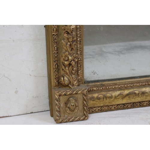 569 - Gilt Framed Rectangular Overmantle Mirror with moulded floral detail, 88cm x 113cm