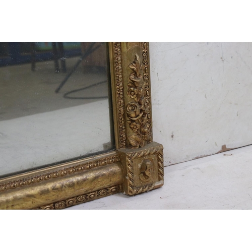 569 - Gilt Framed Rectangular Overmantle Mirror with moulded floral detail, 88cm x 113cm