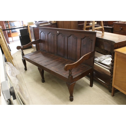 574 - 18th / 19th century Oak Hall Bench with five panel to back, open arms, solid seat, raised on three s... 