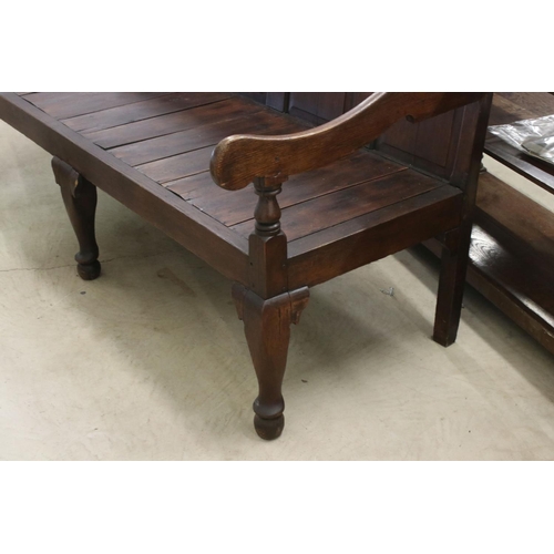 574 - 18th / 19th century Oak Hall Bench with five panel to back, open arms, solid seat, raised on three s... 