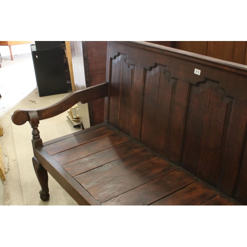 574 - 18th / 19th century Oak Hall Bench with five panel to back, open arms, solid seat, raised on three s... 