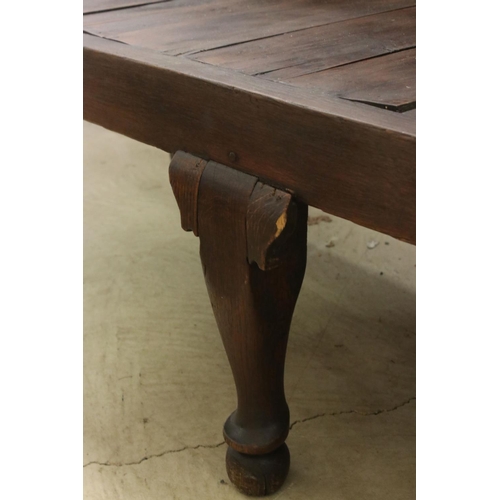 574 - 18th / 19th century Oak Hall Bench with five panel to back, open arms, solid seat, raised on three s... 