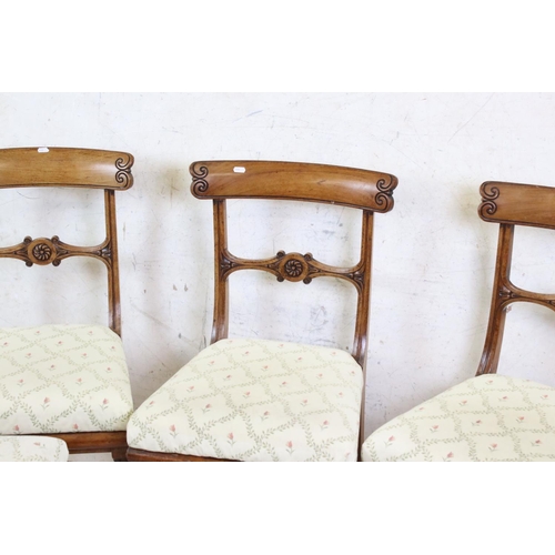 586 - Set of Four William IV Mahogany Dining Chairs with carved crest rails, upholstered seats and raised ... 