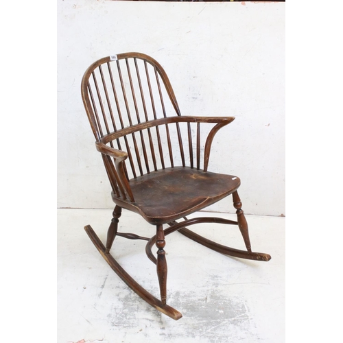 588 - 19th century Ash and Elm Windsor Hoop Back Rocking Elbow Chair with crinoline stretcher, 65cm wide x... 