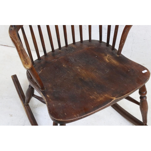 588 - 19th century Ash and Elm Windsor Hoop Back Rocking Elbow Chair with crinoline stretcher, 65cm wide x... 