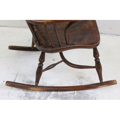 588 - 19th century Ash and Elm Windsor Hoop Back Rocking Elbow Chair with crinoline stretcher, 65cm wide x... 