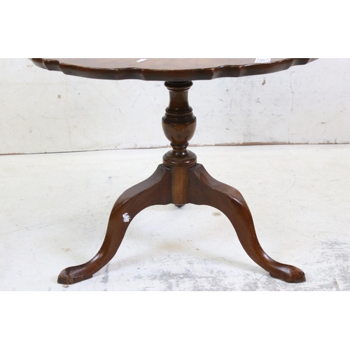 589 - George III style Walnut Tilt Top Low Table, the top with shaped moulded edge over a turned column su... 