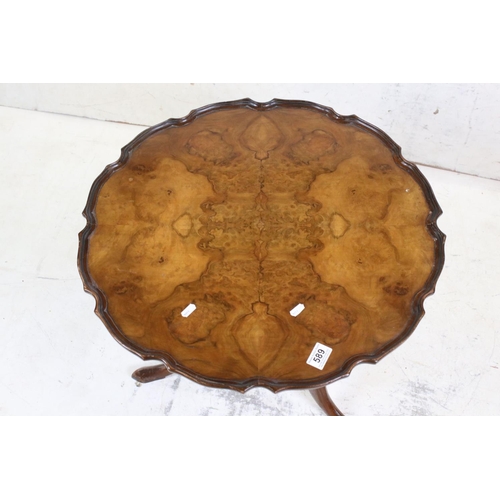 589 - George III style Walnut Tilt Top Low Table, the top with shaped moulded edge over a turned column su... 