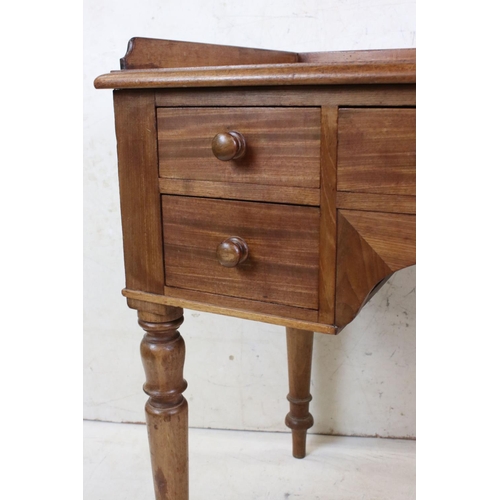 590 - 19th century Mahogany Kneehole Dressing Table with three quarter back rail, an arrangement of four d... 