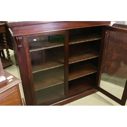 603 - Victorian Mahogany Glazed Display Cabinet, the two doors opening to three adjustable shelves, raised... 