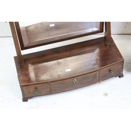 612 - Two 19th century Mahogany Dressing Swing Mirrors, each raised on bow front bases with drawers, talle... 