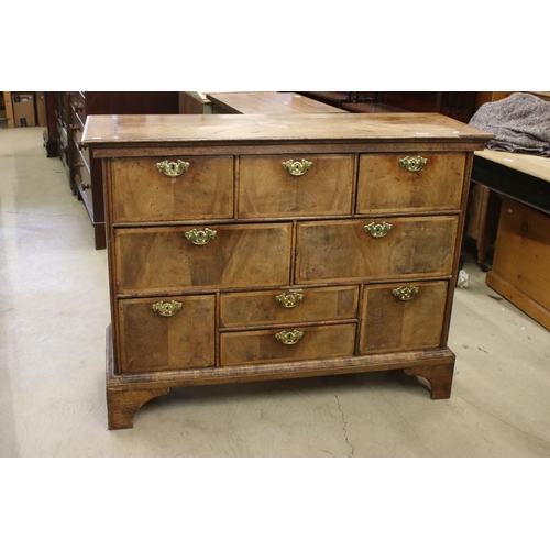 613 - 18th century Walnut and Oak Chest, with an arrangement of Nine Drawers, raised on bracket feet, 125c... 