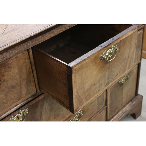 613 - 18th century Walnut and Oak Chest, with an arrangement of Nine Drawers, raised on bracket feet, 125c... 