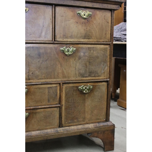 613 - 18th century Walnut and Oak Chest, with an arrangement of Nine Drawers, raised on bracket feet, 125c... 