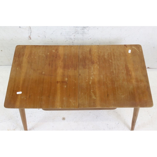 626 - Gordon Russell of Broadway, Mid century Walnut Sewing / Coffee Table, the two section top pulling ba... 