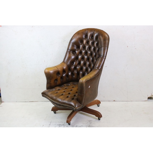 634 - Victorian style Brown Buttoned Leather Upholstered Swivel Armchair, 68cm wide x 118cm high