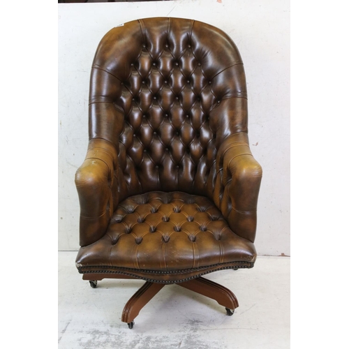 634 - Victorian style Brown Buttoned Leather Upholstered Swivel Armchair, 68cm wide x 118cm high