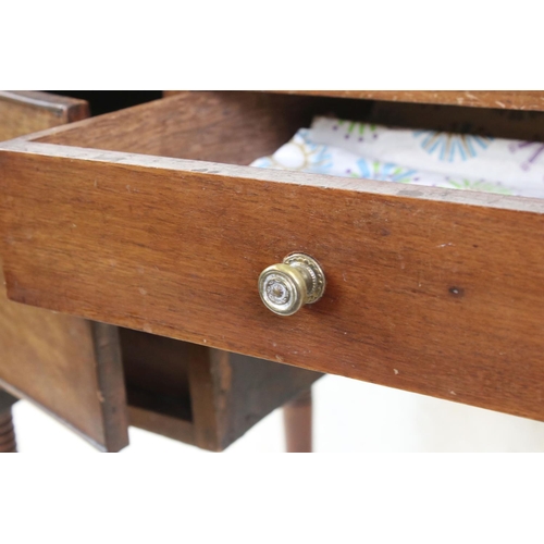 638 - 19th century Mahogany Kneehole Desk / Dressing Table, with three drawers, raised on turned ringed le... 