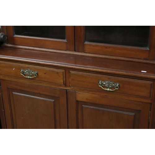 640 - 19th century Mahogany Bookcase, the upper section with two glazed doors opening to three adjustable ... 