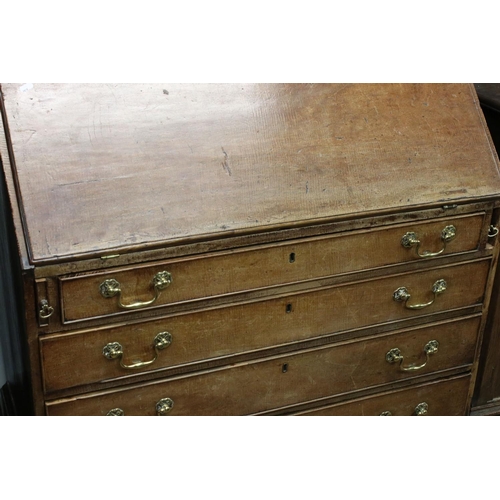 642 - George III Mahogany Bureau Bookcase, the upper section with two astragel glazed doors, over a slopin... 