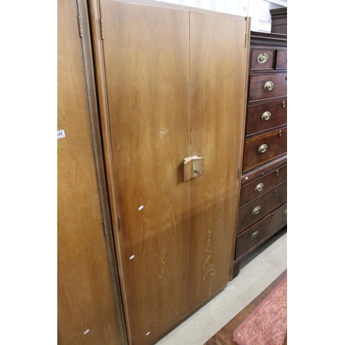 645 - Gordon Russell of Broadway, Pair of Mid century Walnut Wardrobes, both with double doors, one measur... 