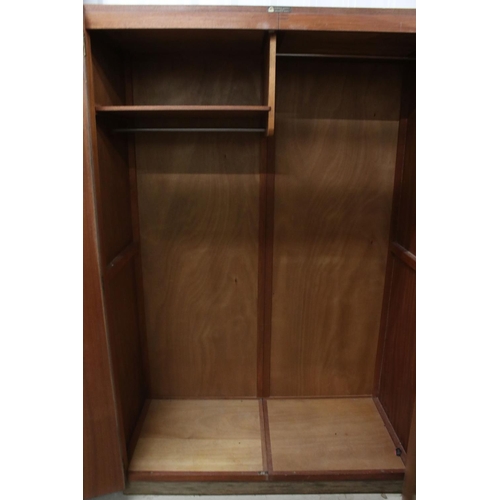 645 - Gordon Russell of Broadway, Pair of Mid century Walnut Wardrobes, both with double doors, one measur... 