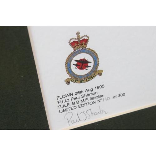 514 - A framed and glazed Douglas Bader Foundation Spitfire print signed with various signatures to includ... 