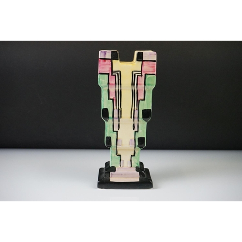 1 - Myott, Son & Co Art Deco 'Chimney' shaped vase, with a tiered geometric polychrome design on a black... 