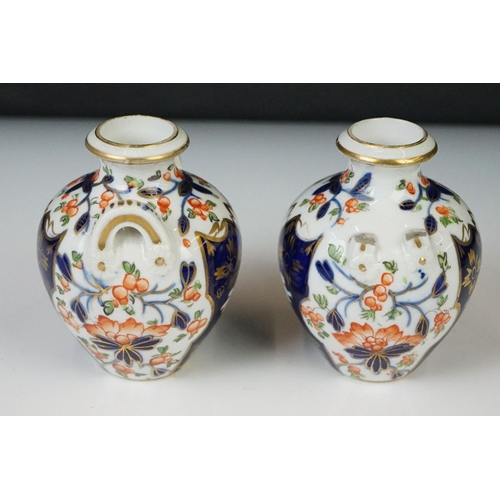 17 - Group of Early 19th Century Crown Derby Imari pattern ceramics, to include two saucers, a pair of mi... 